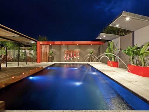 X-Trainer fibreglass pool with deck jet water feature