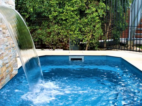 Small plunge pool with a water wall