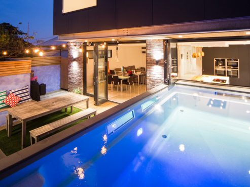 Cleverly built above ground plunge pool with acrylic windows