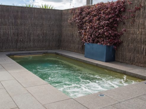 Small pool with tiled around