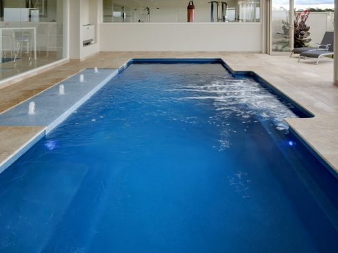 Mark Pollard Pools Vogue family pool with spa jets and sunpod with bubblers water feature