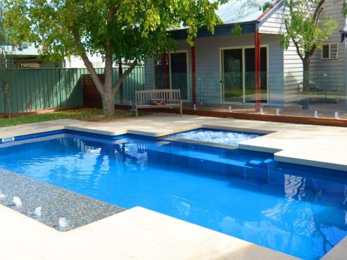 Mark Pollard Pools Vogue family swimming pool sunpod water feature and a spa attached