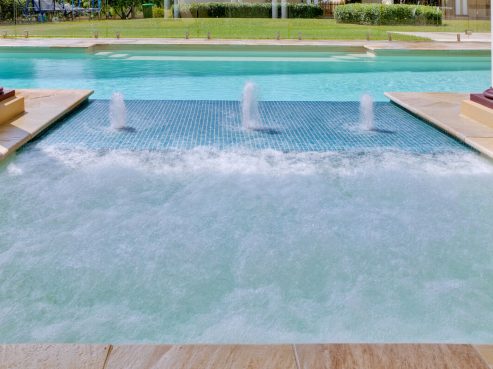 Pool and spa combination with a SunPod