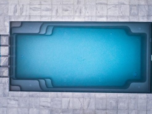 Smart fibreglass pool with a spa installed